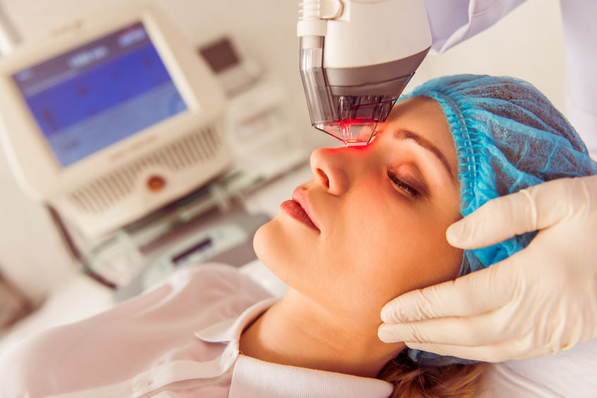 Patient receiving IPL (Intense Pulsed Light) therapy on face, a treatment used to relieve dry eye symptoms