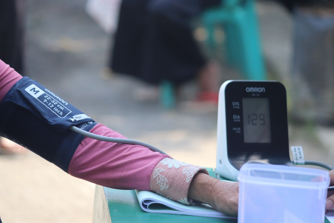 person taking their blood pressure