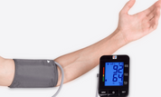 Man wearing Wizard Research Blood Pressure Monitor