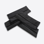 Set of four reusable black fabric mask covers from Wizard Research displayed on a white background